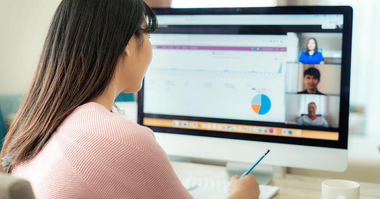 Woman attending a remote meeting